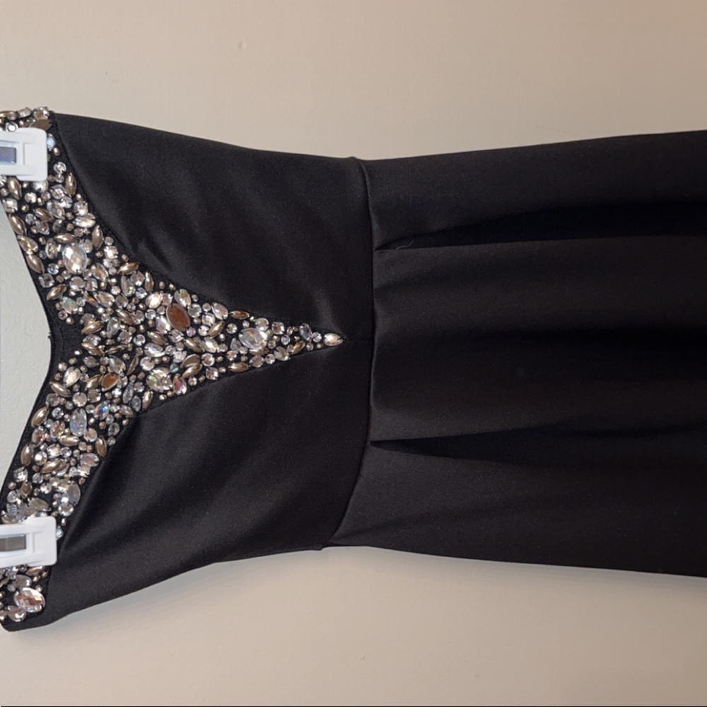 Short strapless diamond black dress, worn for semi dance.